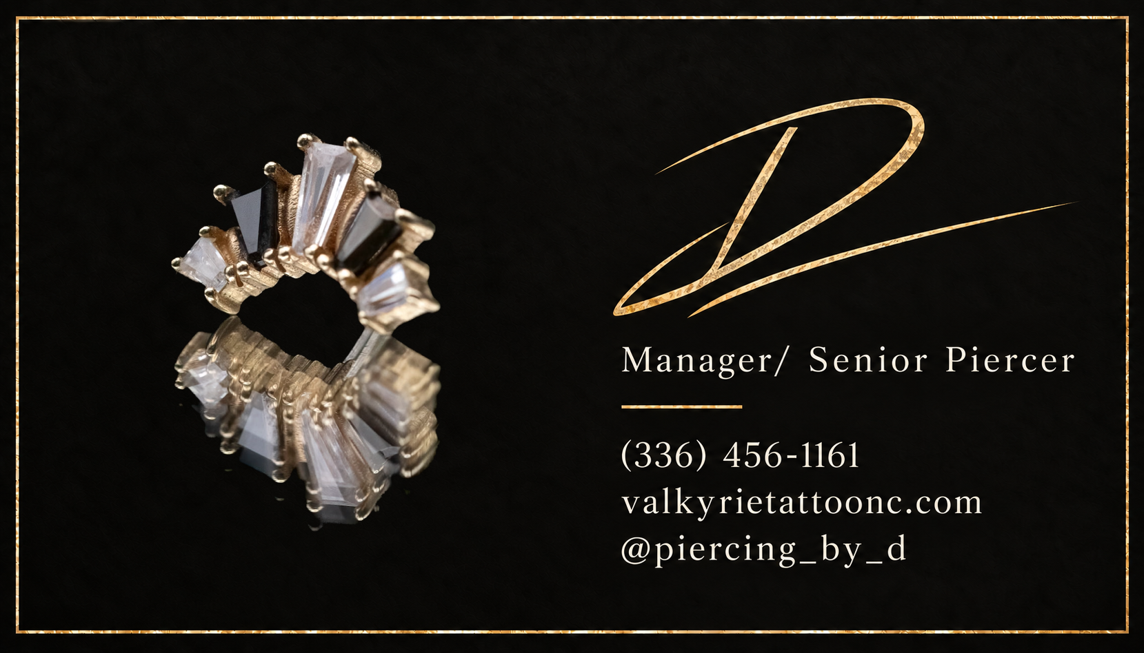 Gold-tone jewelry from D’s business-card artwork